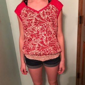 Red flowered blouse with elastic hem